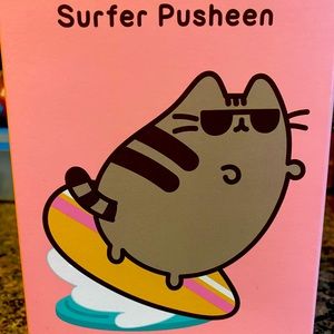 NWT-Pusheen vinyl Surfer Pusheen. Never been opened.